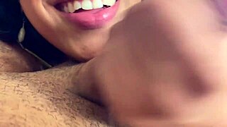 A couple engages in oral and manual stimulation.