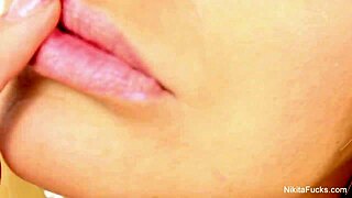 nikita von james toys her wet pussy with big tits in solo fun.