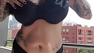 the neighbors are watching me masturbate with my big tits out