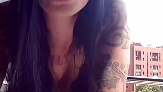 the neighbors are watching me masturbate with my big tits out