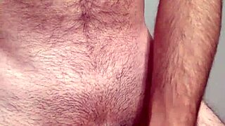 The hard cock throbs during masturbation, leading to a powerful cum and orgasm