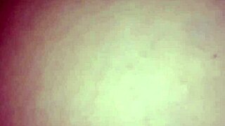 Married couple engages in anal sex at home.