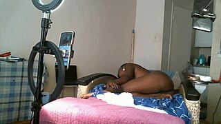 Solo session with a sexy African American MILF showcasing her ass and pussy.