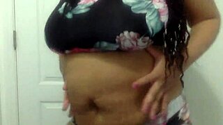 big tit ebony milf dances seductively in the bathroom