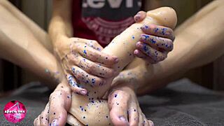 Teen 18+ Girl Plays With Glitters And Gives Footjob To Big Dildo In Fetish Close-Up
