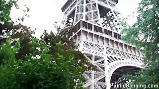 group gathers at eiffel tower for outdoor public event