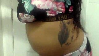 big tit ebony milf dances seductively in the bathroom