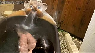 With the mouth of a raccoon in a cute Japanese bathroom massage