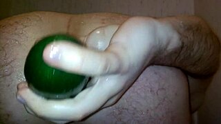 watch this gay guy insert vegetable in his ass during shower sex