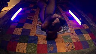 Feeling the sensuality as perfect feet peek through fishnet pantyhose