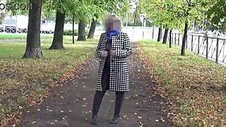 I love seeing this sexy milf in nylon with big boobs and ass walking outdoors in see through outfit