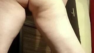 I'm the busty camgirl fingering my ass