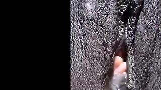 Cyndy Blackslave showing off her shaved pussy in closeup play. Ebony hairless clit teased in bdsm session.