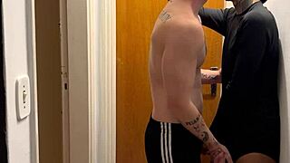 these young guys are kissing and getting caught on the building cam 😏