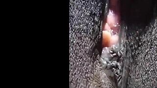 Cyndy Blackslave showing off her shaved pussy in closeup play. Ebony hairless clit teased in bdsm session.