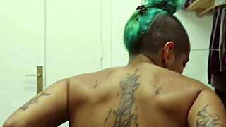 Tattooed girl rips clothes in hot striptease