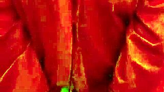 brunette in red lingerie indulges in solo play