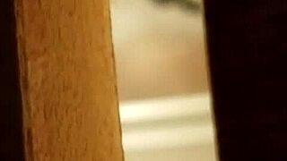 Spying on prostitute touching her hairy pussy.