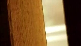 Spying on prostitute touching her hairy pussy.