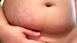 Horny pregnant MILF showing off her big natural tits