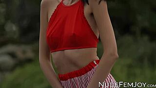 Natural tits brunette Sade Mare engages in sensual outdoor teasing with her shaved pussy nude