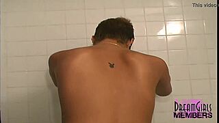 i am a sexy short haired brunette shaving my legs in the shower