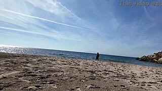 Curvy Nudist Stranger Teases Voyeur with Dildo on Beach