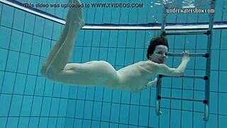 gazel podvodkova swims naked underwater in the pool