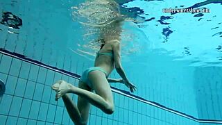 gazel podvodkova swims naked underwater in the pool