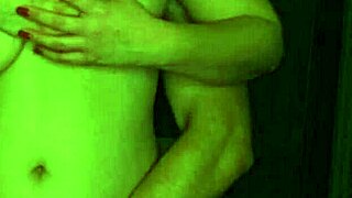 Seducing girlfriend with big breasts caressing in front of camera