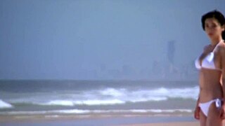 Japanese cutie in a sexy bikini flaunts her big tits with charm