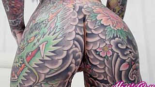 She has couple tattoos featuring Tigerlilly with Damion Dayski.