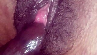 She's playing with her pussy close up