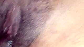 She's playing with her pussy close up