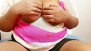 Amateur babe with big tits in a casual setting.