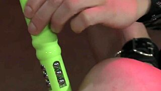 bdsm slave tied up, spanked and vibed with spanking toy.