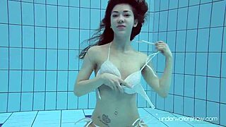 Roxalana Cheh Explores Underwater as a Czech Redhead