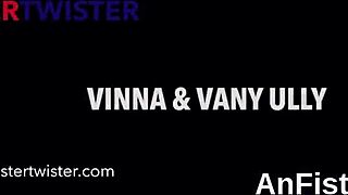 Frisky lesbian lovers fist and fuck each other's pussies