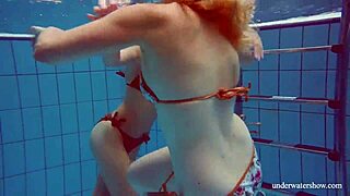 marusia and melisa darkova do underwater striptease in bikini