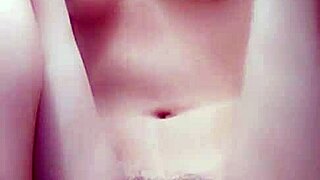 A young Asian woman helps herself in a private moment.