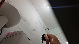 I’m spying on her showering after school in the bathroom.