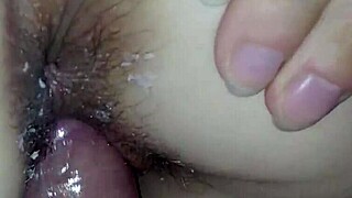 Casual date with petite girl using condom in homemade setting