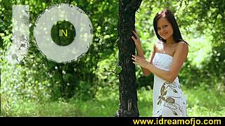 brunette girl masturbates alone in the woods outdoors