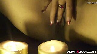 horny asian babe fingers herself with wild abandon