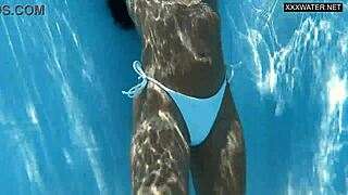 Angelica, the best milf, strips naked in the swimming pool.