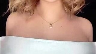 Japanese babe shows off big boobs in sexy pool dance