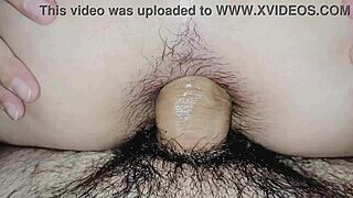Wife rides husband in quick anal session, reaching orgasm together.