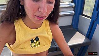 Teen beauty gives close up blowjob on ferris wheel in public amusement park