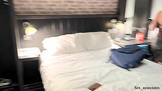 sharing a bed with a coworker led to unexpected gay action at the hotel.