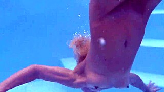 Wow, sexy milf Emily Ross bares her stunning body underwater just for you!